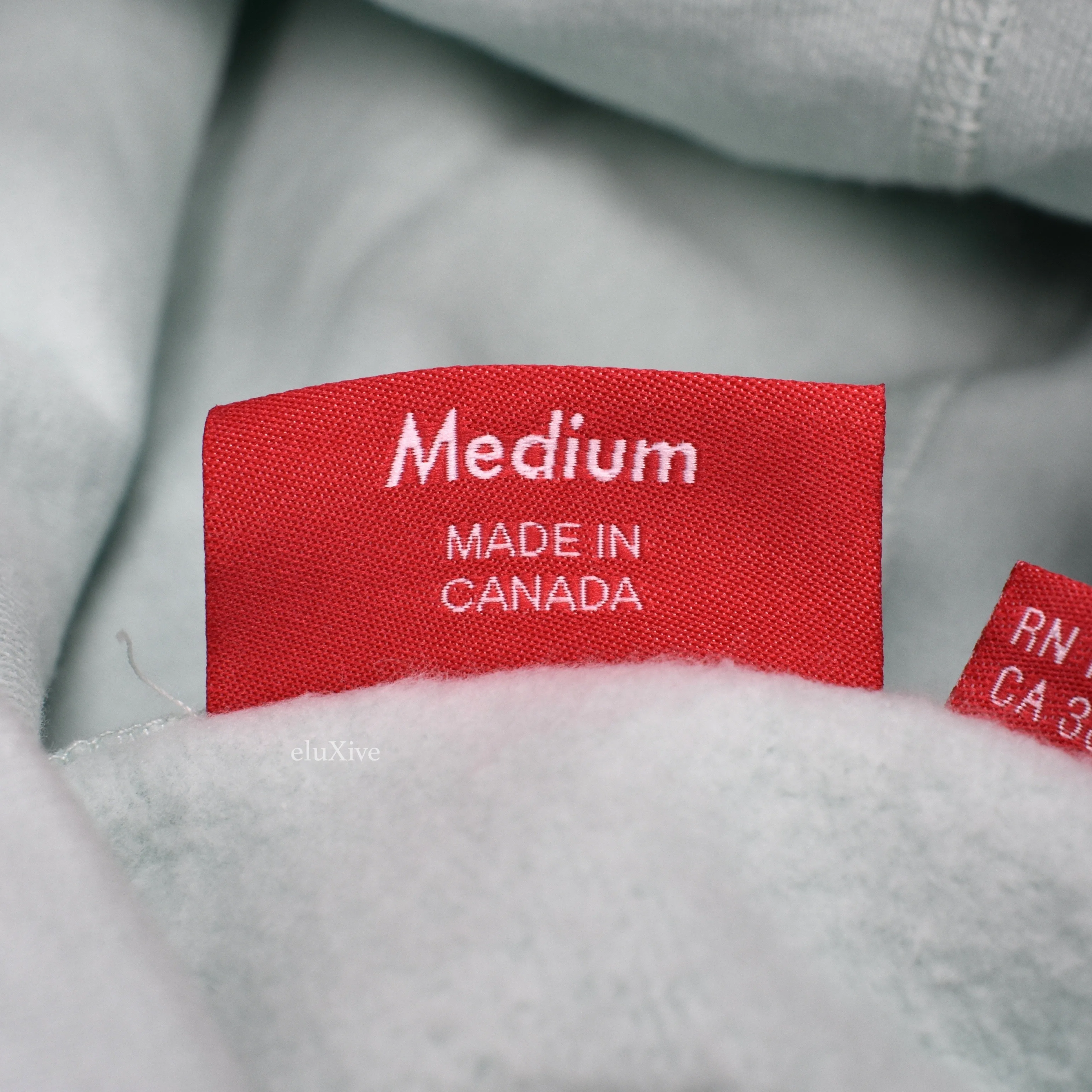 Supreme - Ice Blue Centerpiece Logo Hoodie